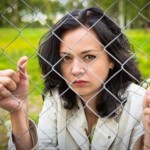 Captive behind steel-wire