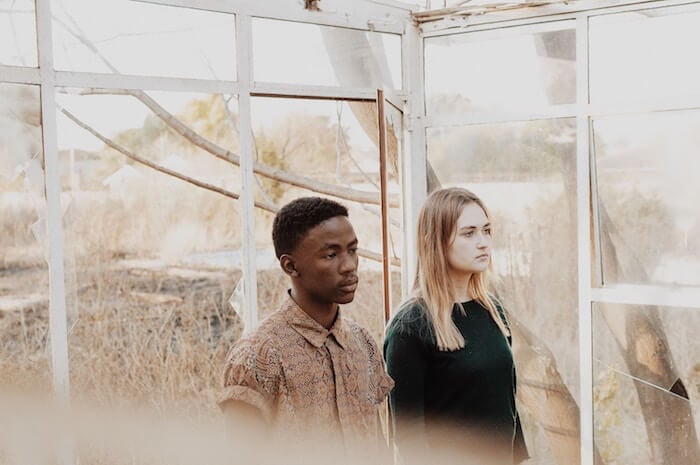 couple standing outside signs of gaslighting