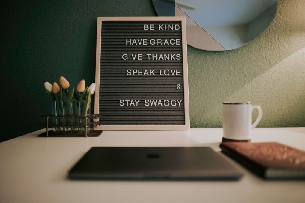 sign on desk, words to live by