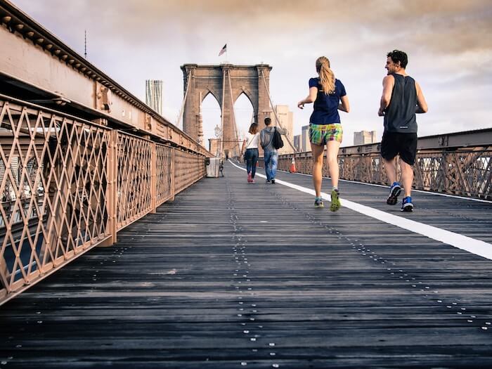 Couple run on bridge Platonic relationship