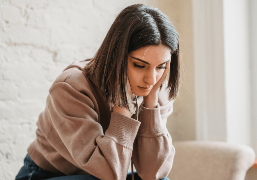 sad girl thinking how to stop overthinking in a relationship