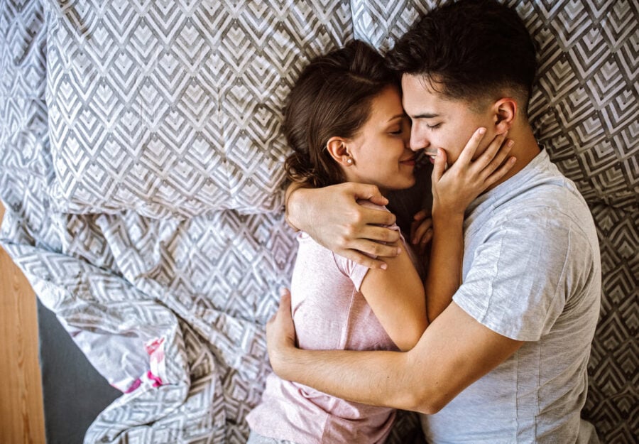couple embracing how to be a better lover