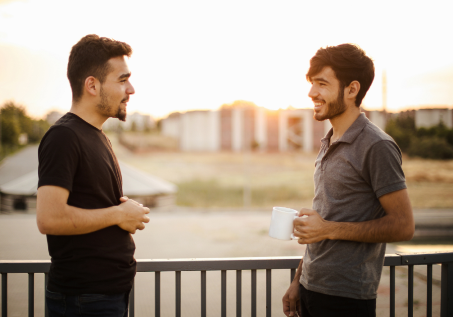 two males talking outside Is my husband gay