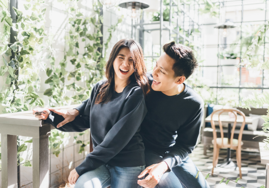 happy couple outside laughing cute names to call your boyfriend