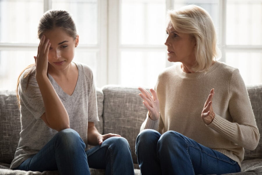 annoyed mother scolding daughter emotionally immature parents