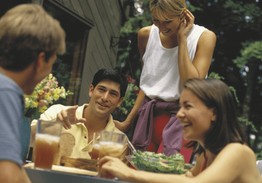 group of friends eating outside shy extrovert