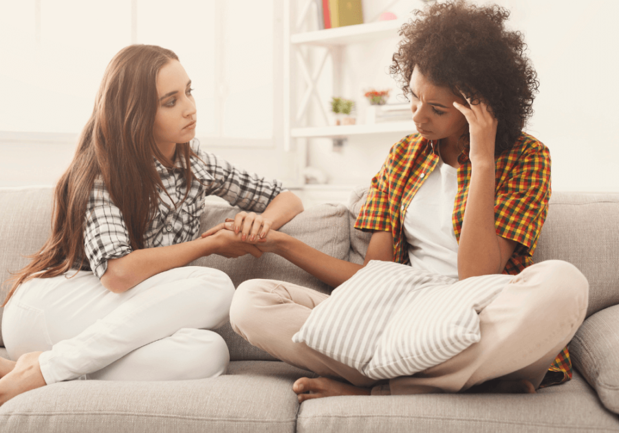 woman comforting upset friend morals vs values