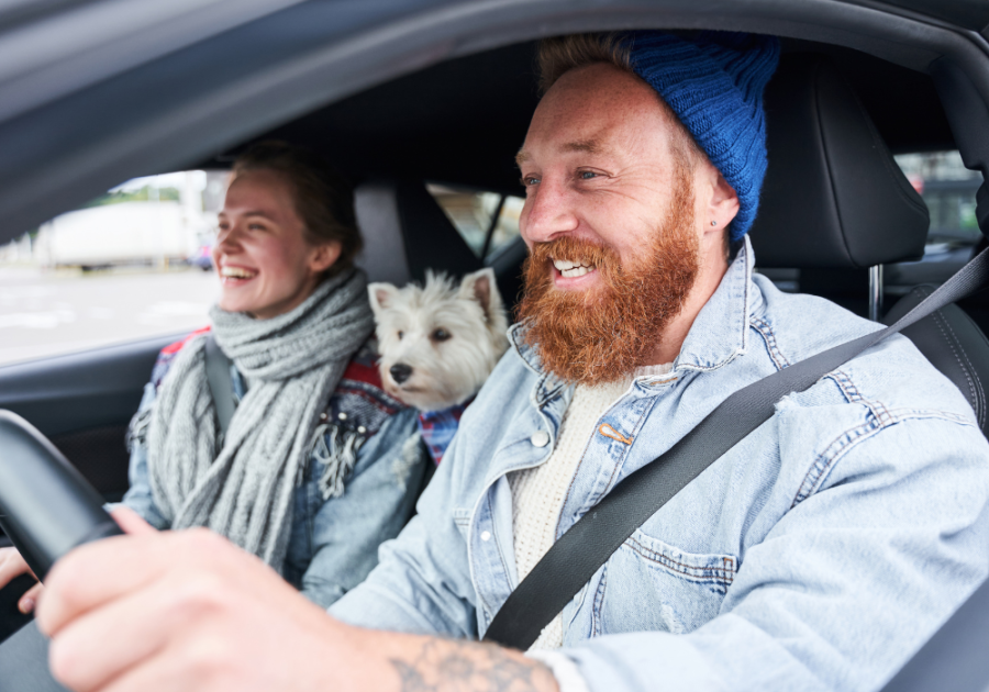 man driving his girl around with their dog questions to ask before moving in together