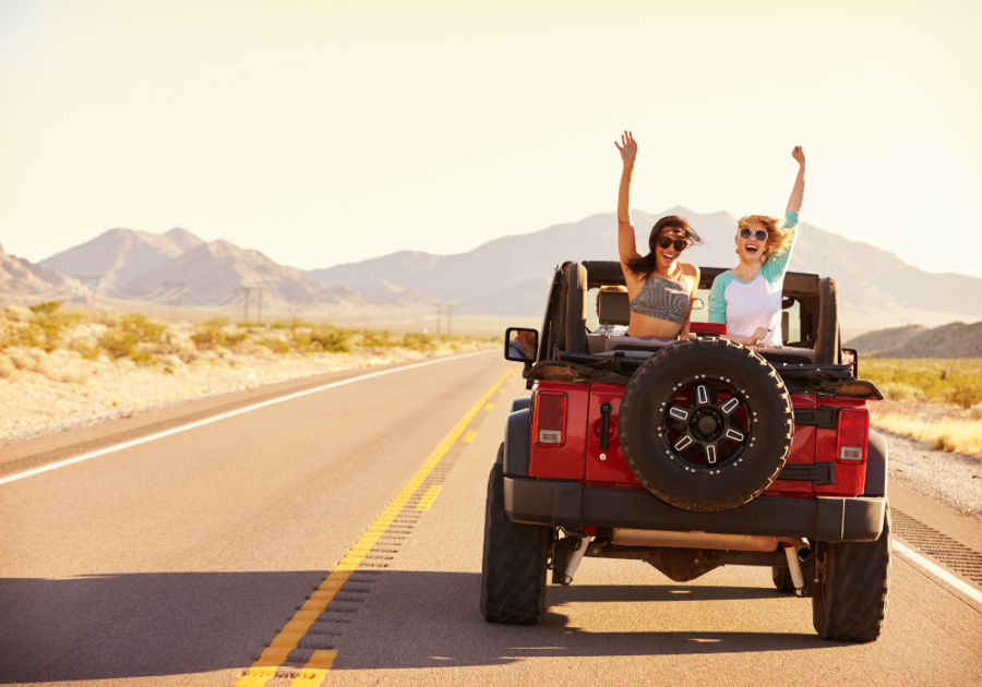 happy young woman waving from care things to do before 30
