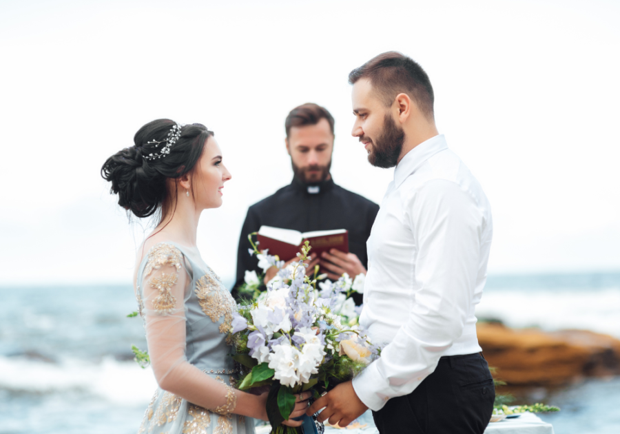 couple having a beach wedding romantic wedding vows to make him cry