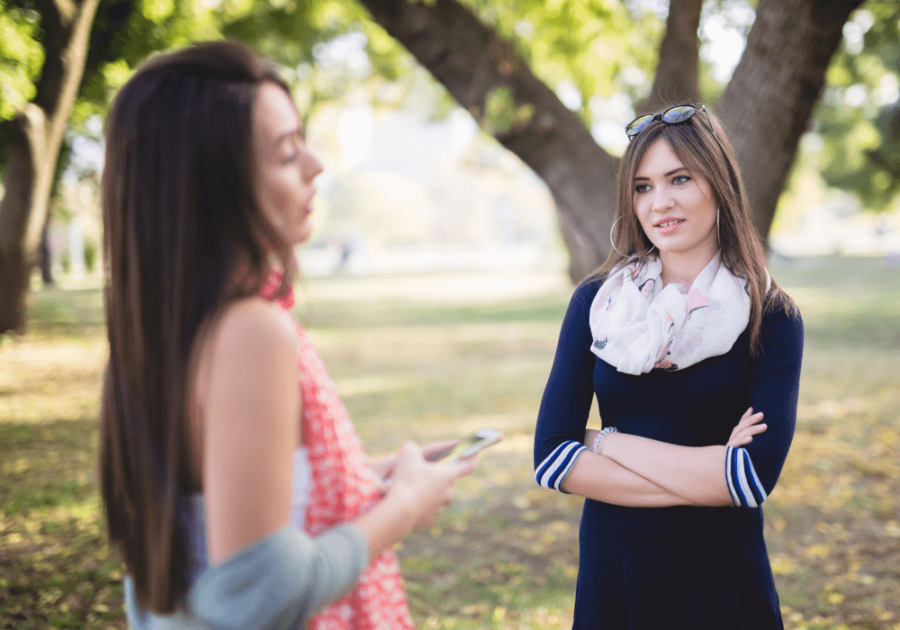 two women in disagreement when someone lies to you and you know the truth