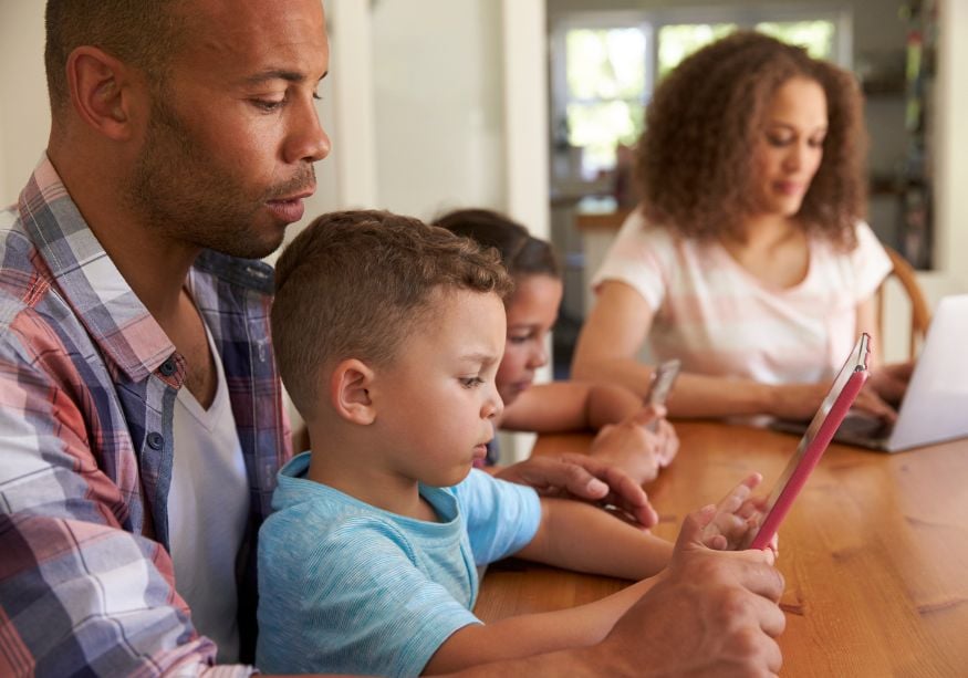 family sitting at table Rules for Living Together When Separated 
