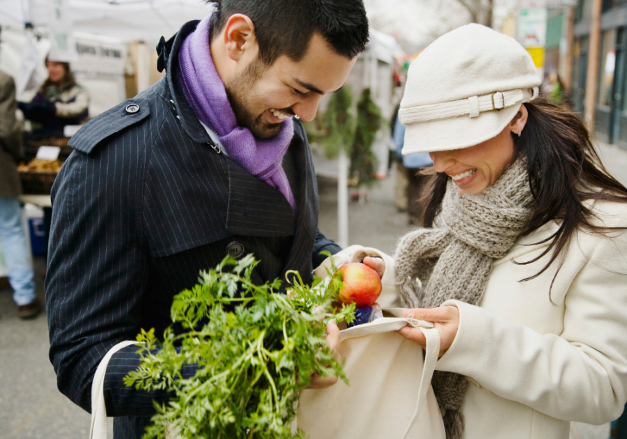 couple at outdoor market together Last-Minute Date Ideas  