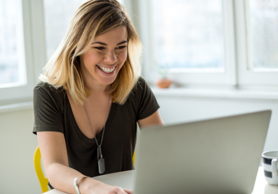 woman smiling while on computer Funny Hinge Prompt Answers