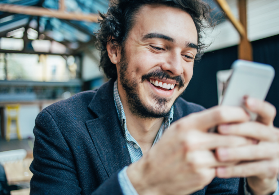 man laughing while texting on phone Funny Hinge Prompt Answers