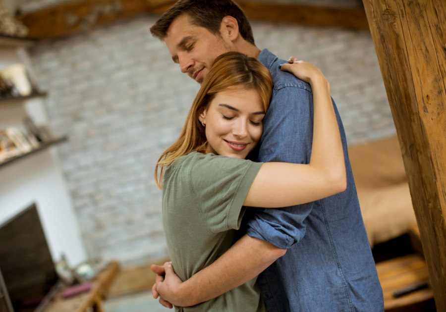 couple hugging and smiling Expectations in a Relationship