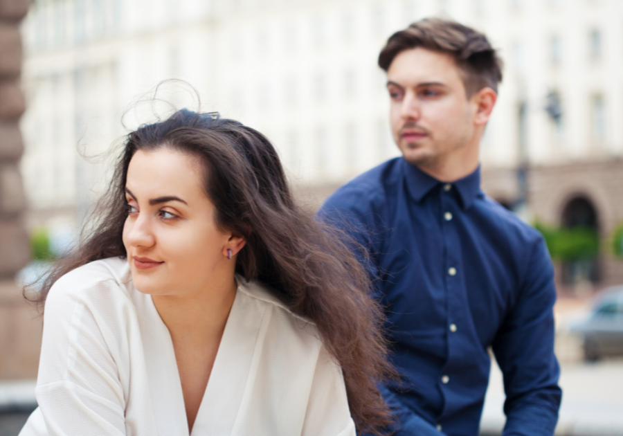 couple looking away outdoors Losing Feelings