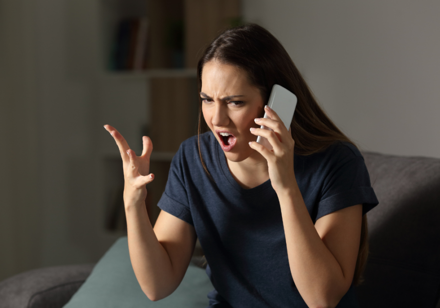 woman angry on phone Smart Replies to Rude Comments