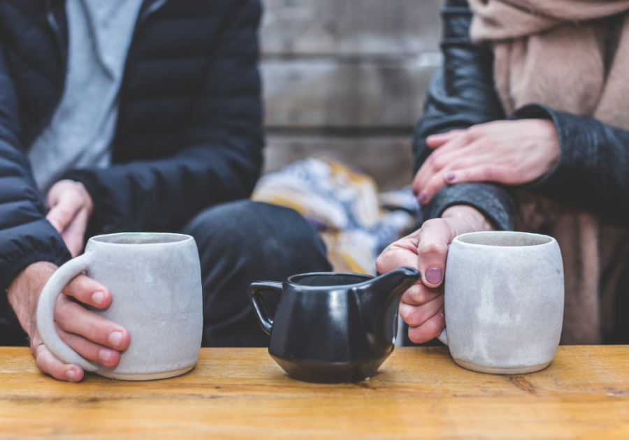 people holding coffee mugs sitting together Become More Emotionally Available 