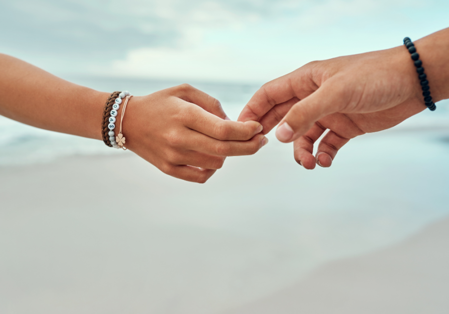 Couple holding hands How to Emotionally Detach from Someone