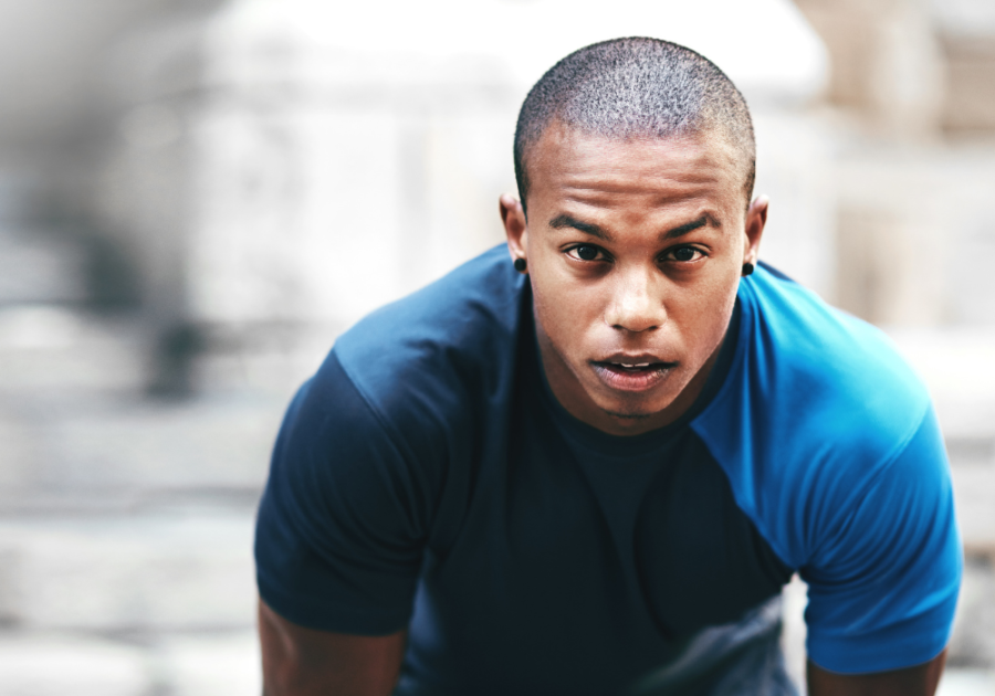 man outside looking straight ahead traits of a stoic personality