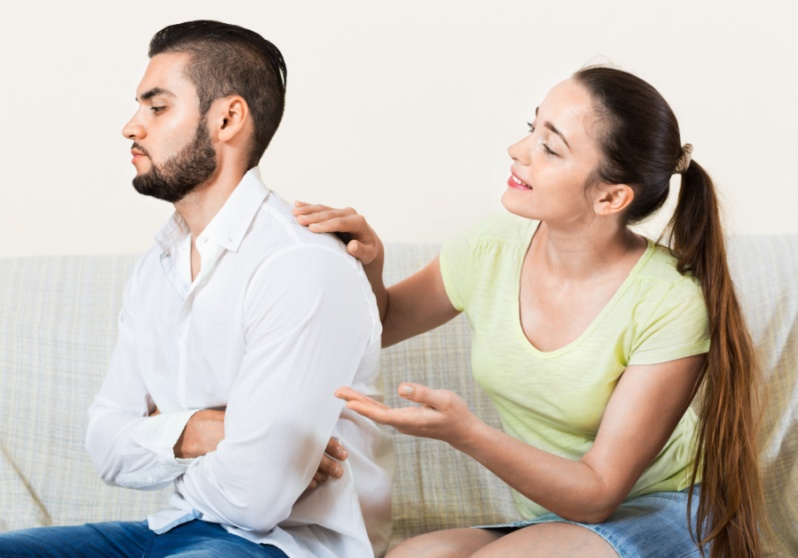 Couple on couch, man is back How to tell someone you just want to be friends