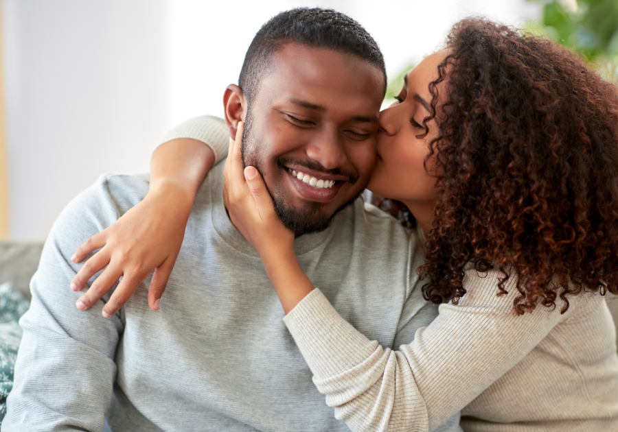 woman kissing man What an Aquarius Man Needs in a Woman