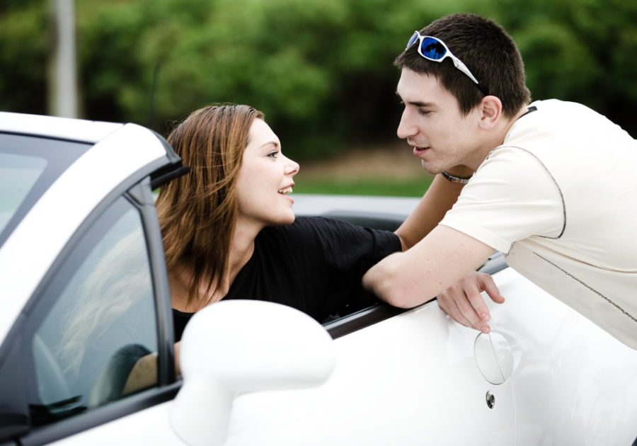 Man leaning on woman's car Do men like being called handsome?