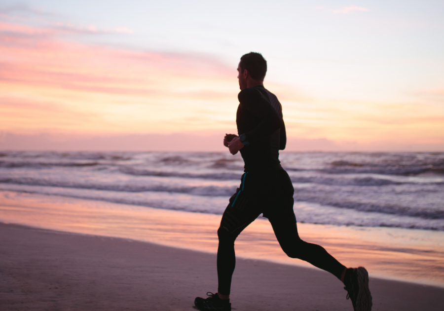 man running on beach signs you're healing from a breakup