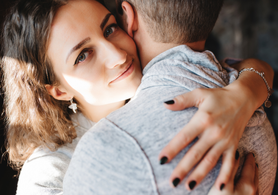 woman hugging man Why Do Girls Hug Guys Around the Neck