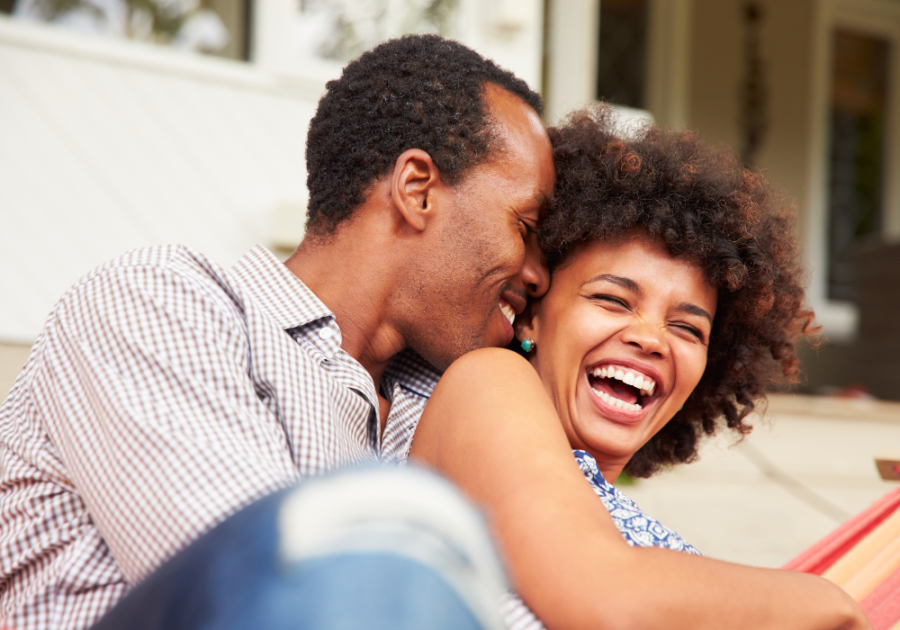 couple laying down laughing Casual Relationship is Getting Serious