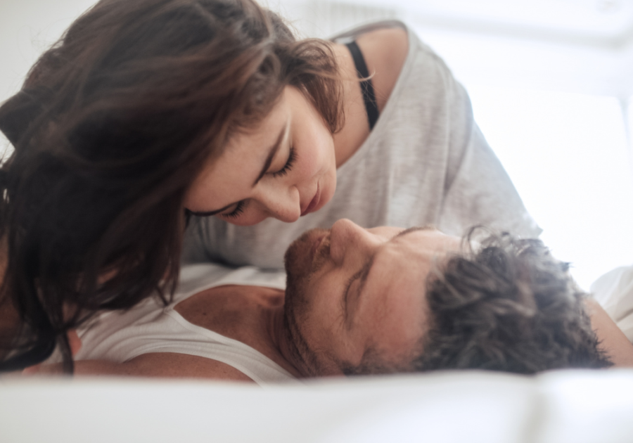 woman on top of man looking closely Open Marriage Rules