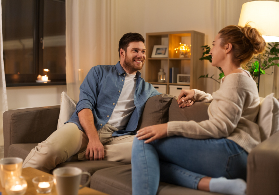 couple sitting on sofa talking Relationship Contract template