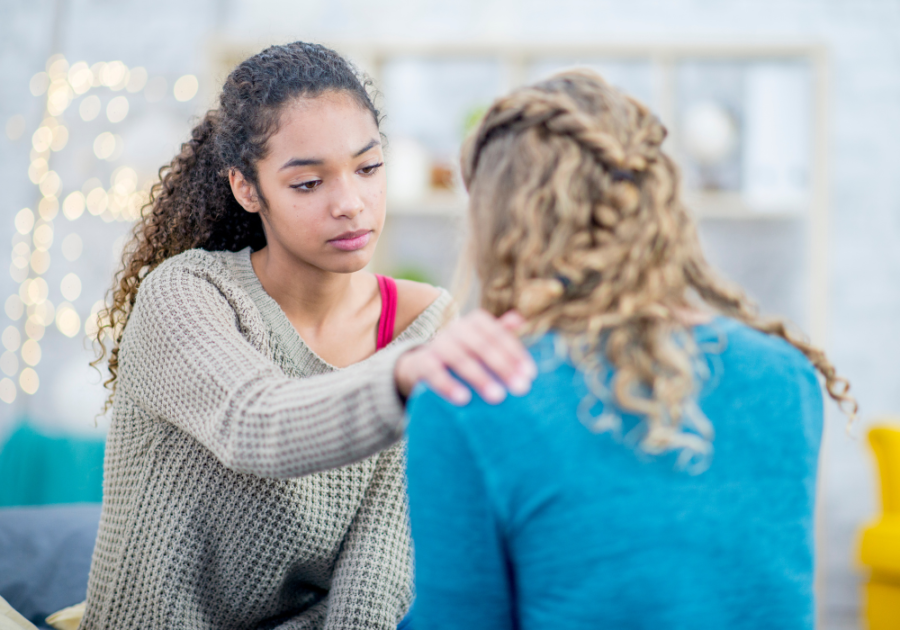 women sitting alone talking Emotional Dumping