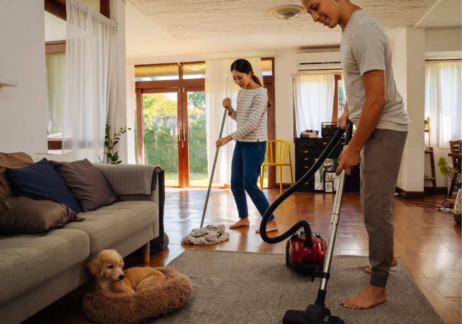 couple cleaning house together How to Be a Better Husband