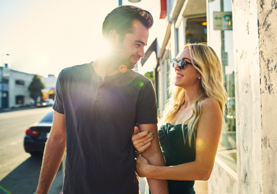 couple walking outdoors what makes a man sexually attractive